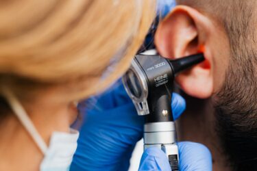 ear examination. hearing tests are not free in alberta canada.