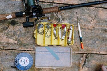 Fishing hooks and angling gear. It is currently legal to fish with barbed hooks in Alberta.
