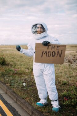 hitchhiking astronaut. It is legal to hitchhike in Alberta, Canada, unless there are municipal bylaws.