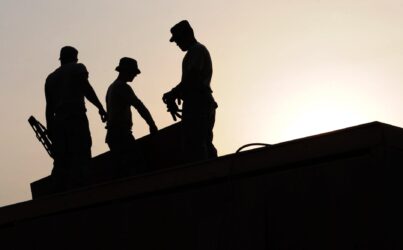 building construction site work outside in heat. Alberta does not have temperature restrictions for workers.