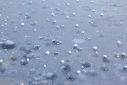 hail balls after heavy rain lying on ice. When is hail season in alberta canada.