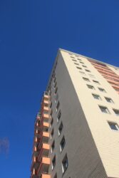 low angle view of high-rise rental building. What is tenant insurance in alberta canada .